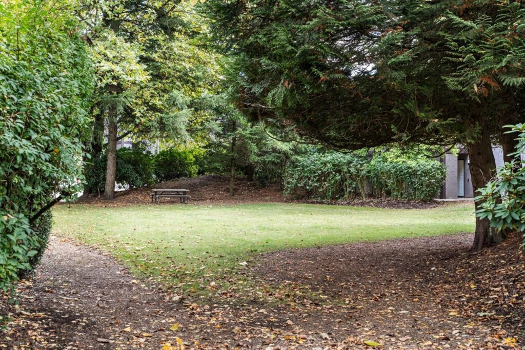 Walking path through the grounds of The Gardens