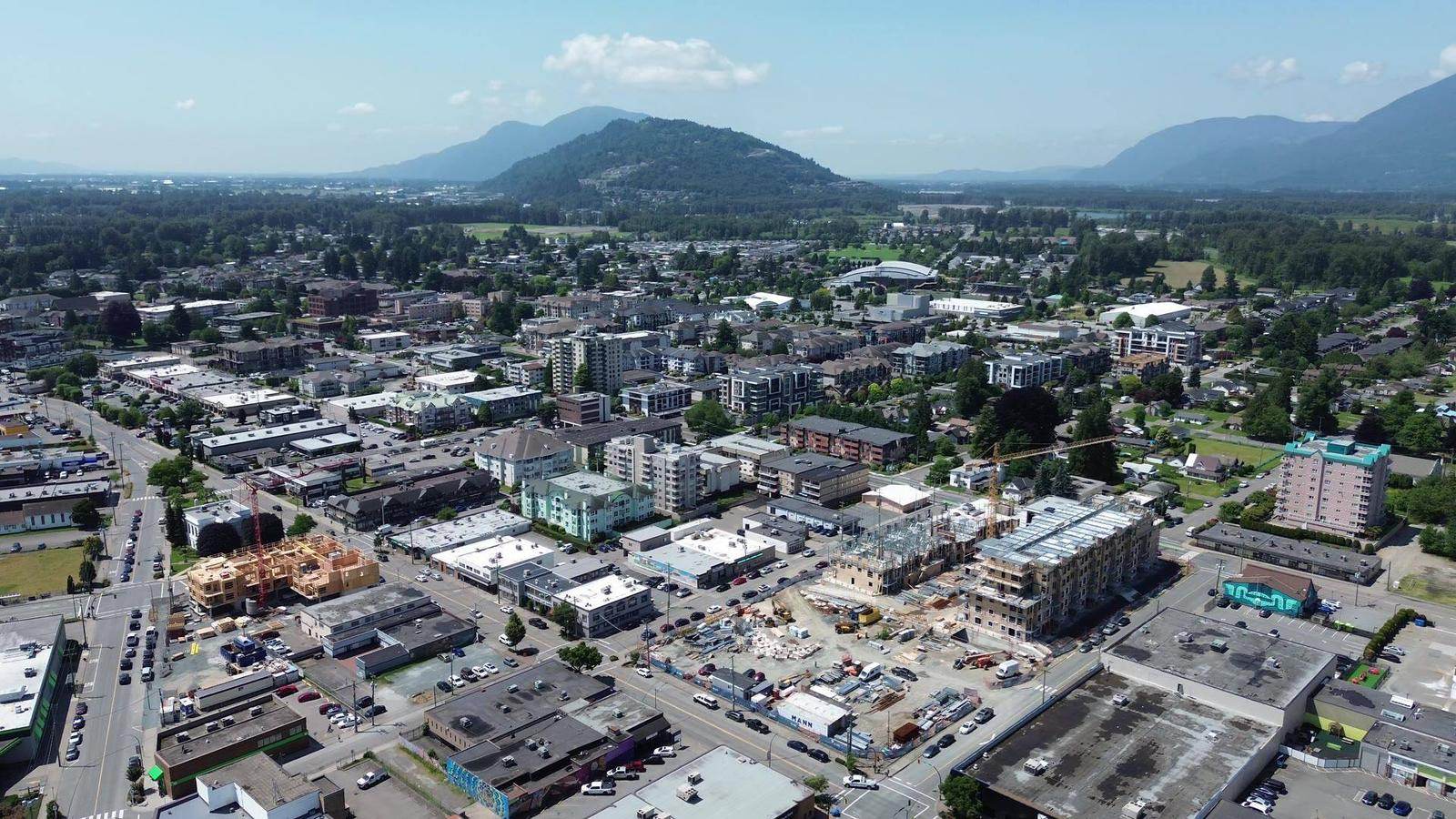 Aerial view of downtown Chilliwack with the mountains behind