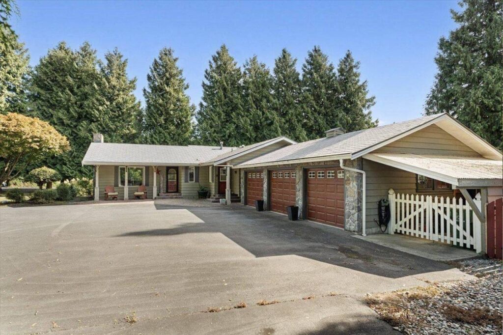 Rancher with a triple garage at 42420 Adams Road in Greendale