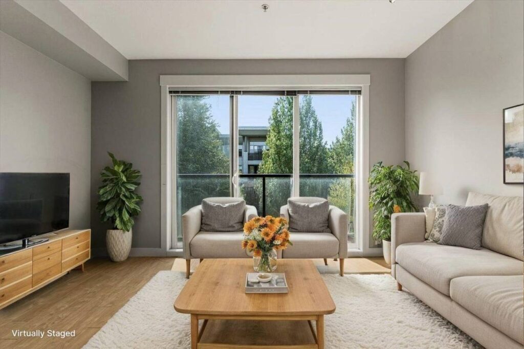 Triple wide glass slider facing south, virtually staged, at 310 33539 Holland Avenue