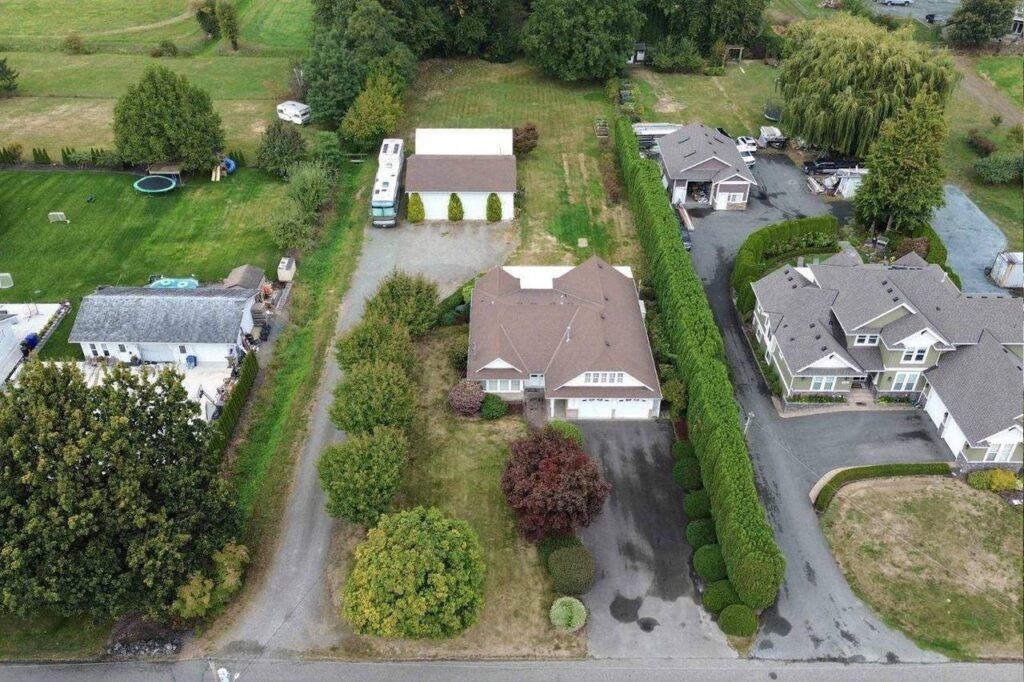 Aerial of 42703 Janzen Road showing the house, shop, dry storage and 1.07 acres