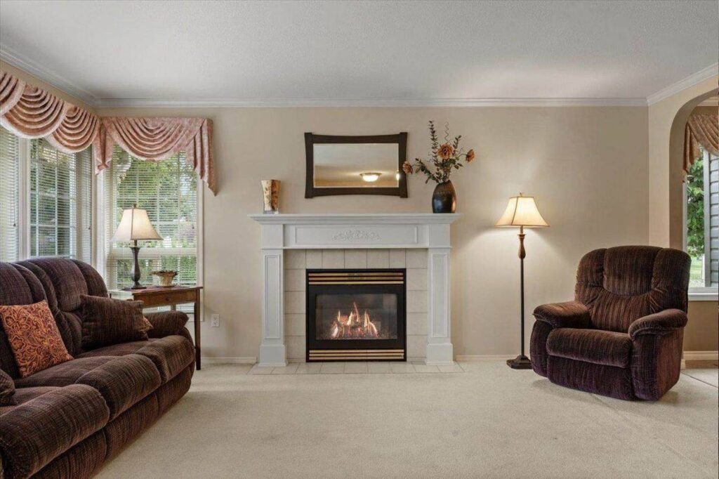 Living room with a gas fireplace at 42703 Janzen Road