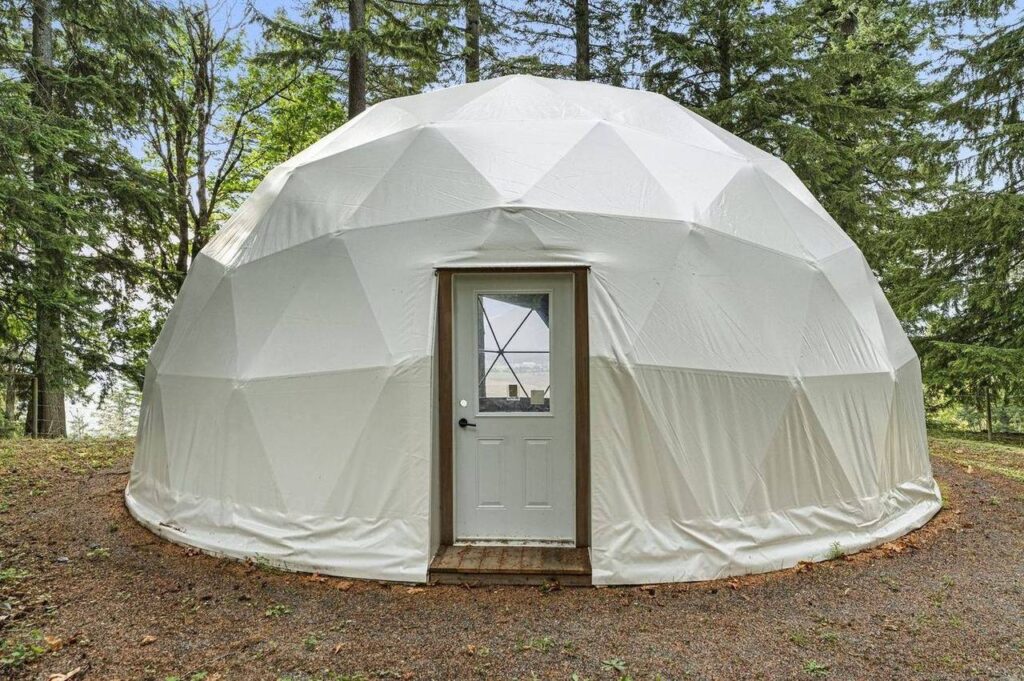 Geodesic glamping dome in the upper pasture at 48625 Wincott Road