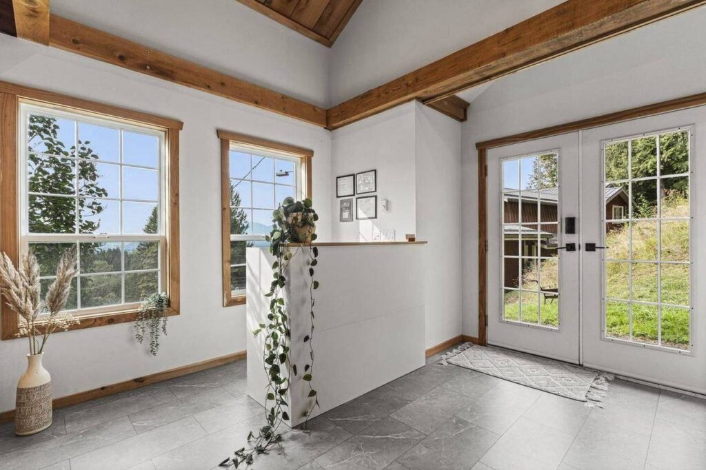 Bright studio interior with French doors at 48625 Wincott Road